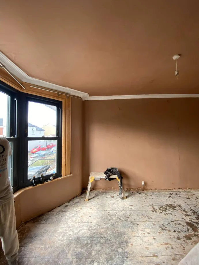 Bay window and skimmed walls with original coving retained