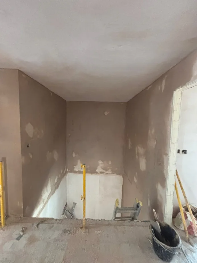 Room skimmed around a stairwell opening, props still in place